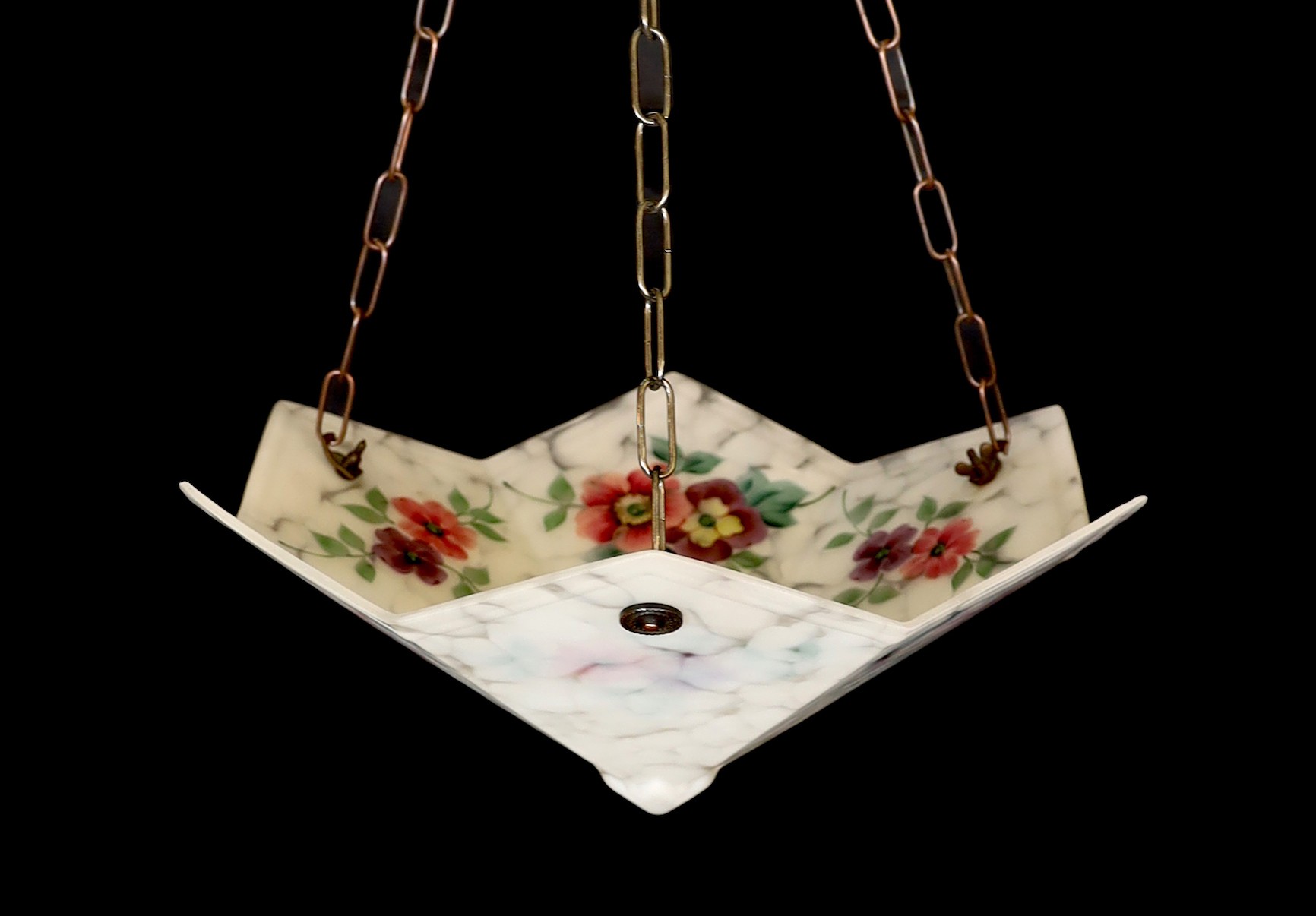 A 1930s hexagonal marbled glass light bowl with internal floral decoration, width 46cm
